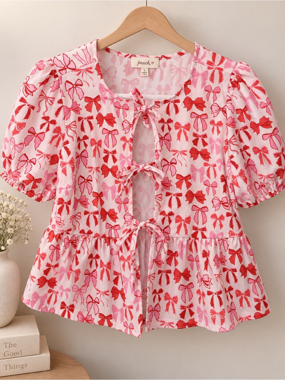 Pink Bow-Print Tie-Front Peplum Blouse